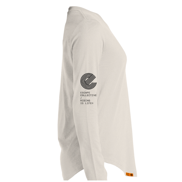 An off-white long-sleeve t-shirt shown from a side profile view against a plain white background. The shirt features a black circular graphic and the text 'ESCAPE COLLECTIVE WEARING IS LIFE' printed on the left sleeve, with a small orange tag near the bottom hem.